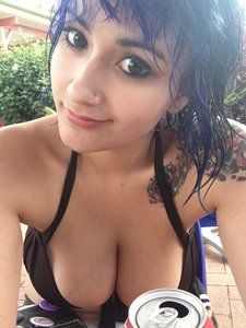 Cute busty teen taking a selfie