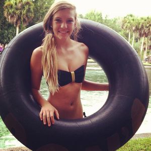 Sexy Blonde Teen in a black Swimsuit