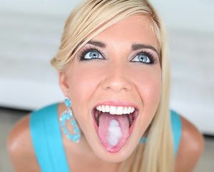 Perfect 10 blonde looking up with a mouthful of cum