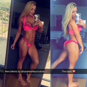 Blonde model checking out her goods in a new bikini