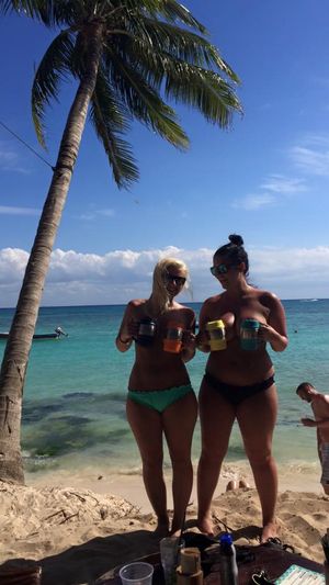 Amateur babes topless on the beach