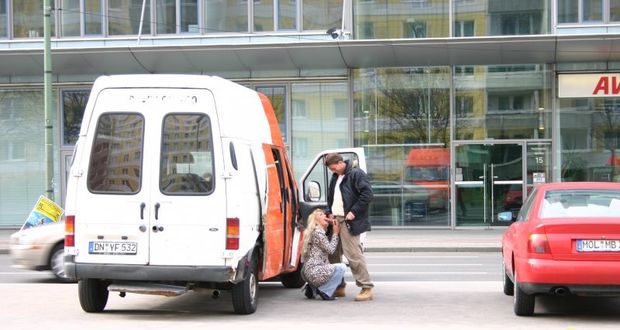 xnxx -  Busty blonde MILF blowjobs in public.