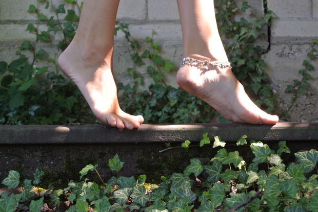 Hippie feet on the rail