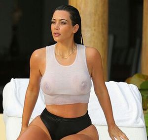 Kim Kardashian see through top at the pool