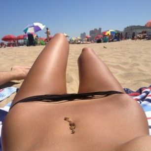 Sexy bikini bridge and landing strip at the beach