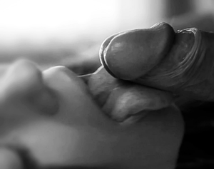 My tongue licking the head….there are some juices dripping out….