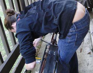 Bicycle woman shows buttcrack