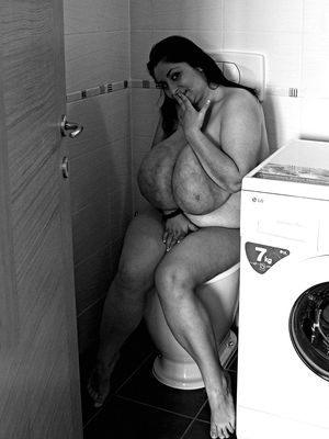 Huge titted BBW on the toilet