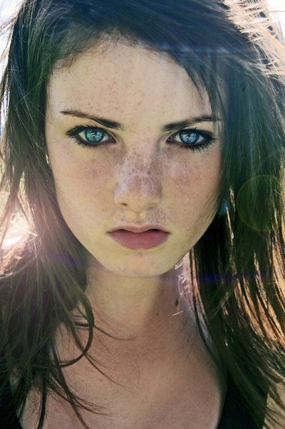 hot brunette with blue eyes