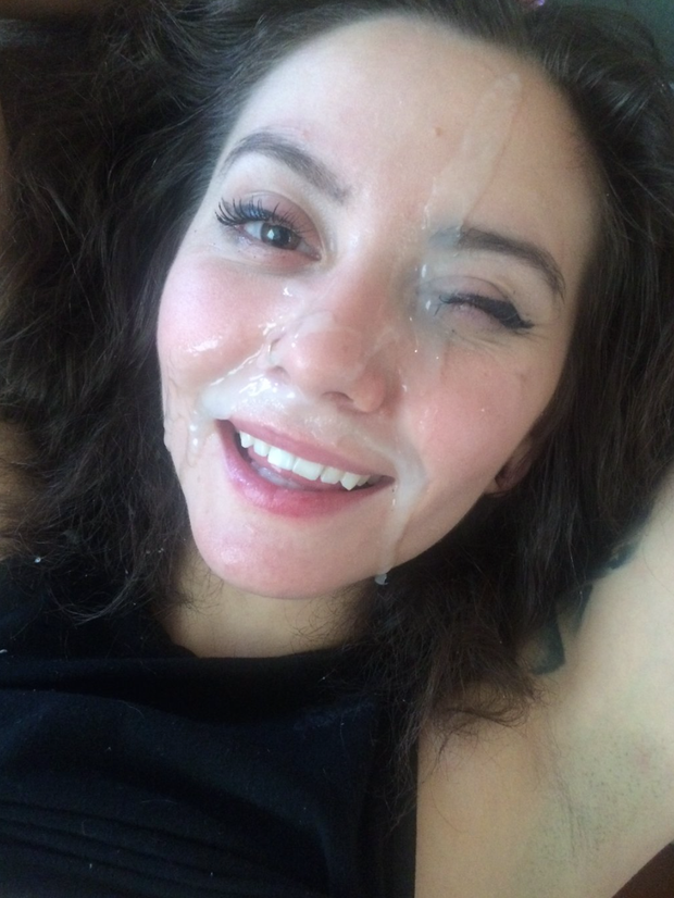 Brunette with cum on her face