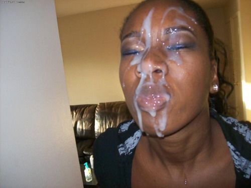 Black chick with cum on her face