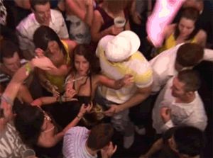 She enjoys having her boobs exposed and groped at the party.