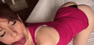 Gorgeous redhead sucks and shows off her ass