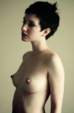 Short haired brunette with nice perky tits