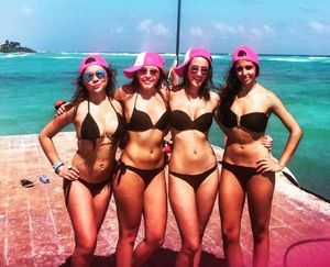 Wearing hot black bikinis