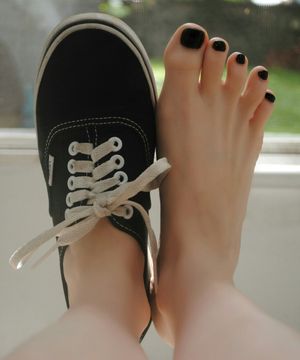 sexy foot pic one bare foot one in a sneaker