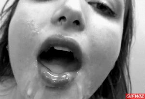 Brunette first swishes the cum around in her mouth, then swallows it.