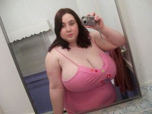 Brunette with HUGE Tits takes a selfie