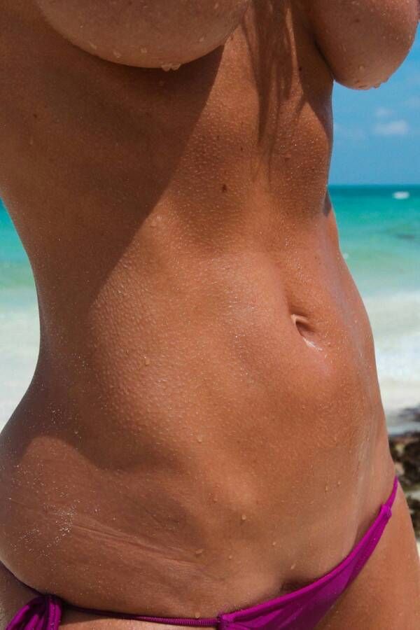 fit bod at the beach with underboob