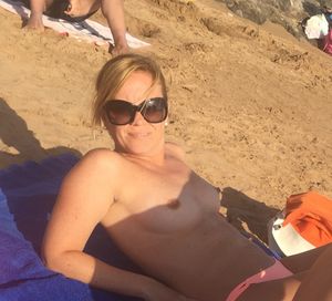 Boob flash at the beach