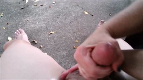 Outdoor Handjob Leads to a Big Load of Cum.