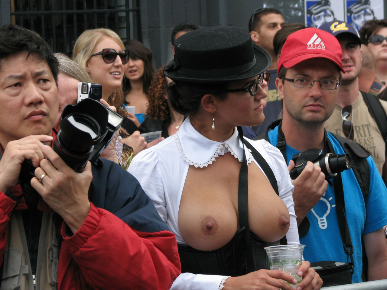 Enyoying the event topless.