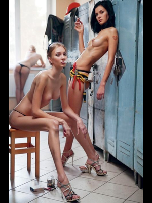Models smoking cigarettes in locker room