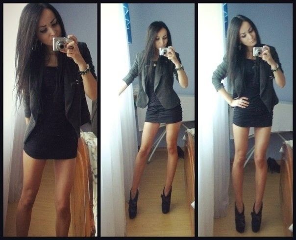 Hot brunette in black minidress