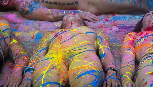 She's got to know that while she's being painted, her pussy is wide open and on display for all to see and photograph