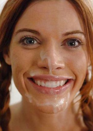 Genuine redhead hippie with cum dribbling down nose and chin