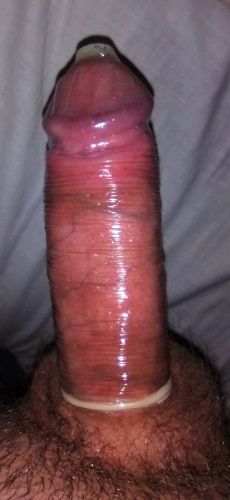 My cock in condom 3