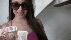 Brunette takes cash for a blowjob.