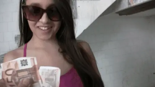 Brunette takes cash for a blowjob.