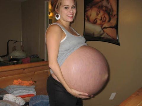 If You Look Closely You'll See She's Showing a Tiny Baby Bump