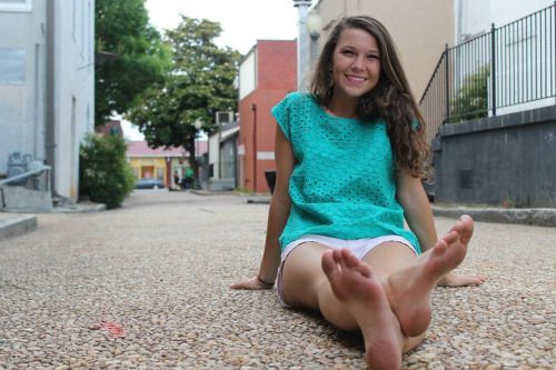 cute barefoot teen in the street