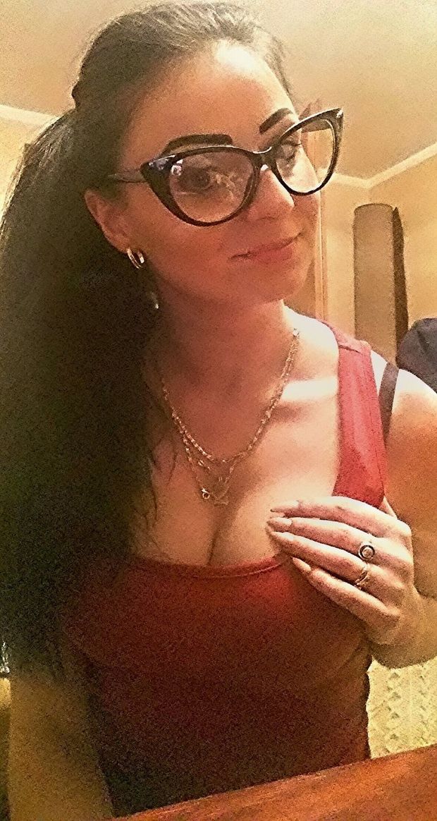 Nice busty chick posing in vintage glasses