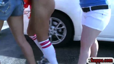 Babes stripped naked in the parking lot and making out