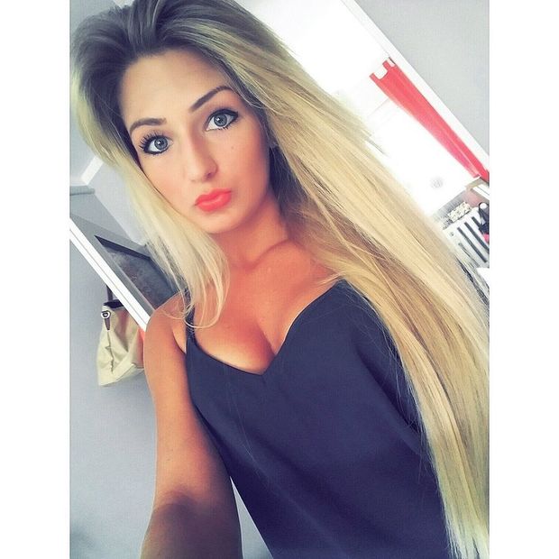 Blonde fuckdoll posing for another mirror shot