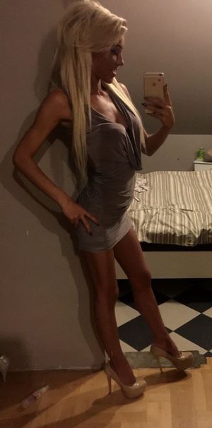 Blonde bimbo at home