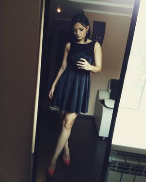 Nice chick taking a mirror shot in new outfit