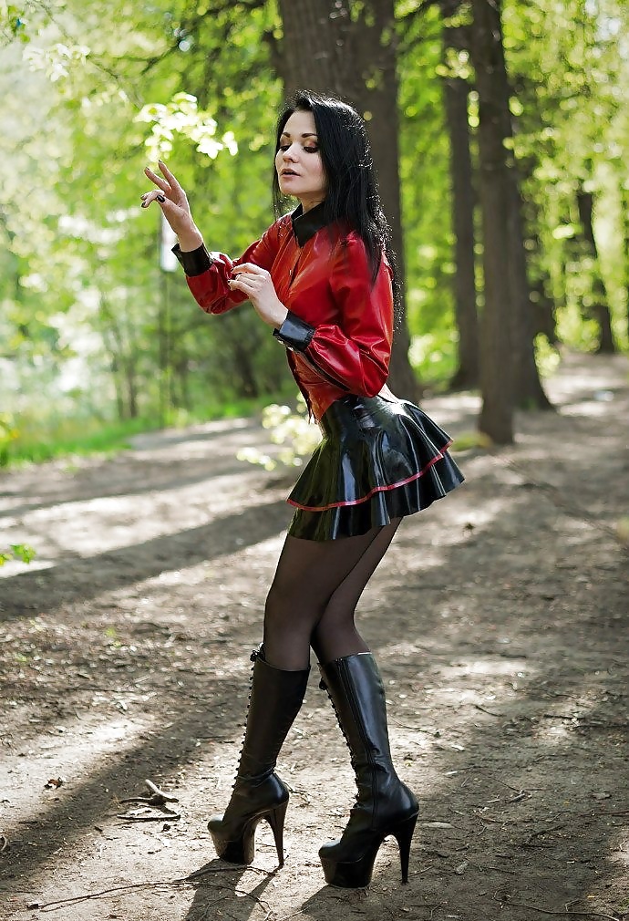 Pretty damn hot latex godness posing in the park