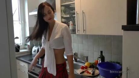 Brunette Cheerleader fucked in kitchen- See more on www.teencamz.com