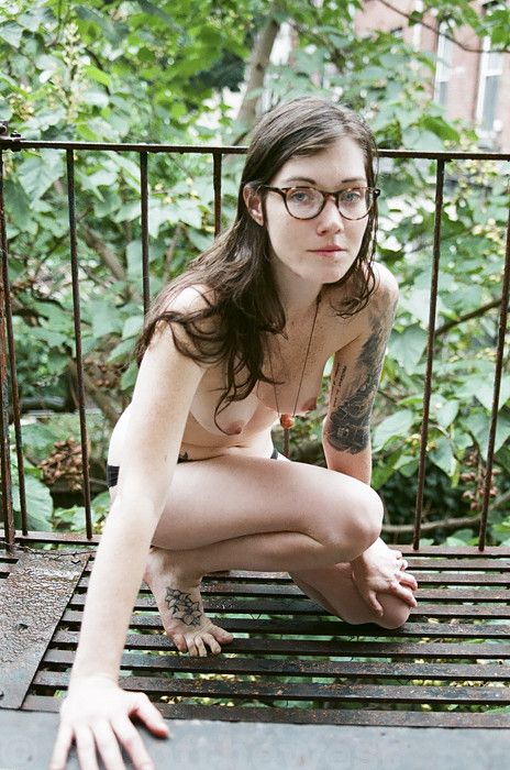 Glasses and tattoos