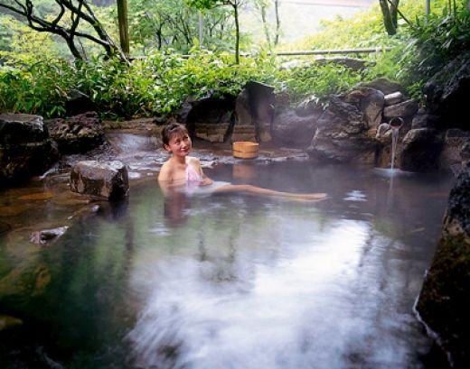 Older Nude Japanese Woman Relaxing In Onsen Pool