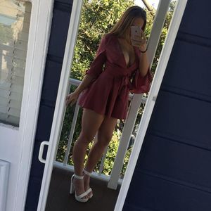 Babe taking a selfie on the balcony.