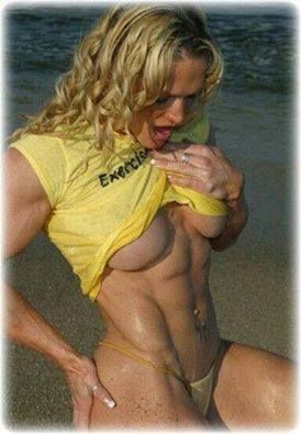 muscle hot woman at the beach