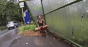 Sexy brunette power pissing in public