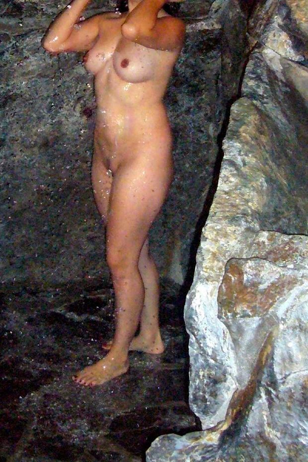 Wife is naked in hotel room shower in view while hotel workers are in the room cleaning up a spill.