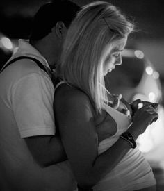 Casually grabbing her boobs