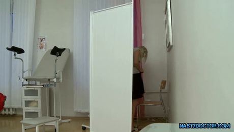 Big tit teen sucks off the horny doctor